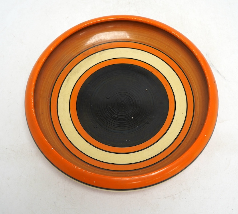A Clarice Cliff Fantasque shallow dish, 24cm in diameter. Condition - fair